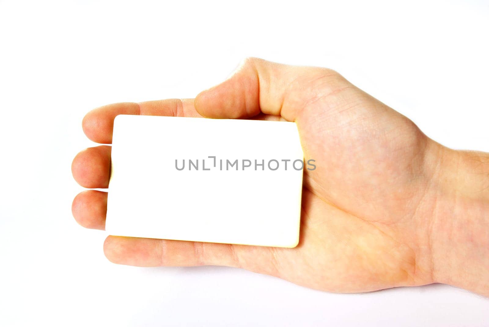 Man hand holding a blank business card