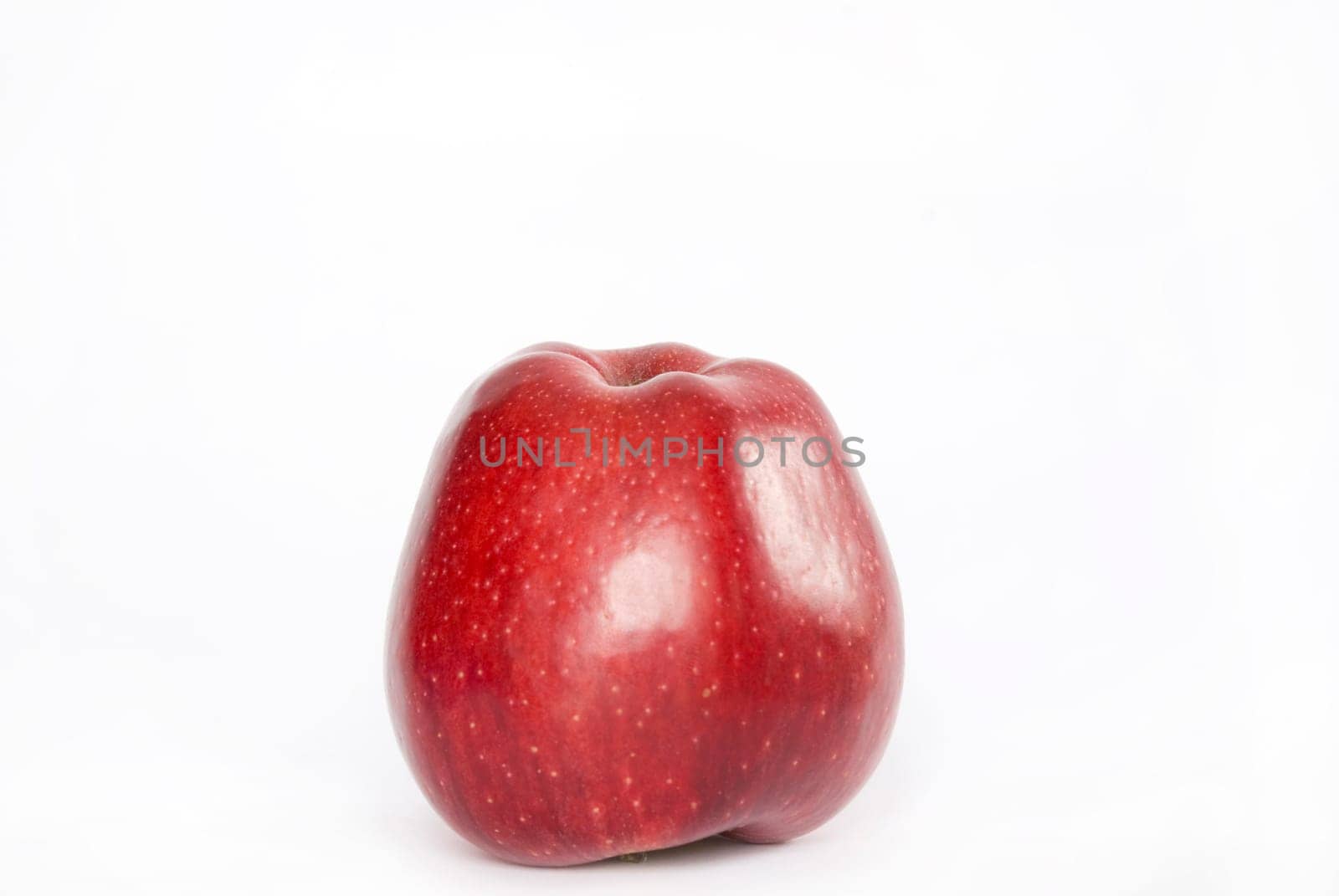 One red apple on white background
