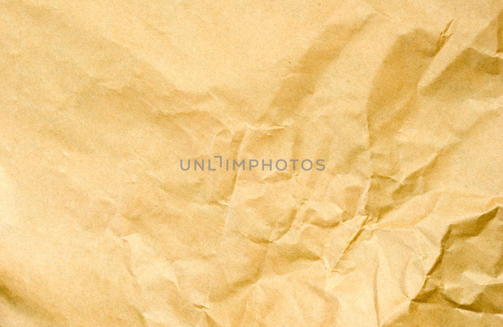 old brown crumpled paper. Texture background