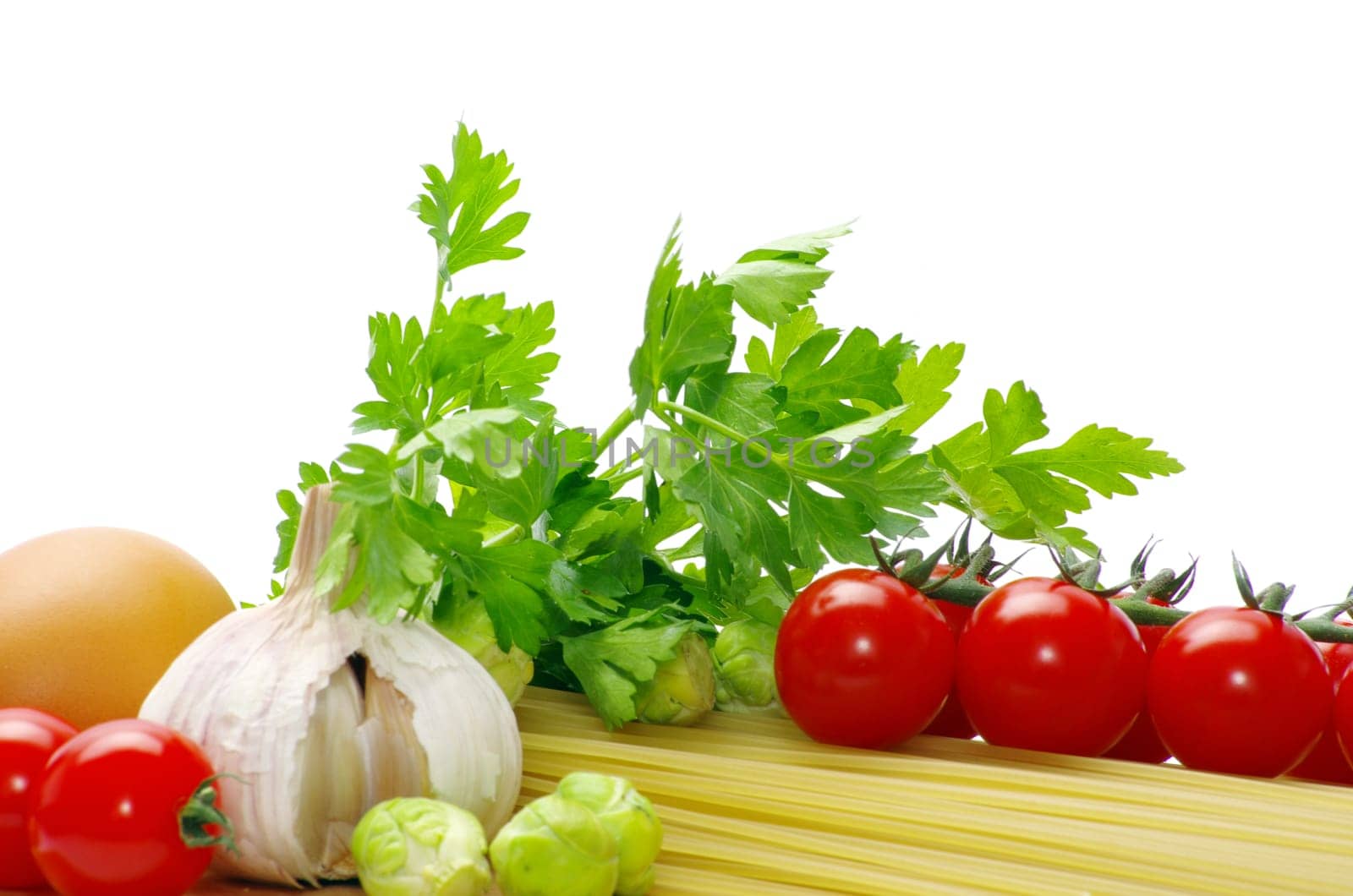 pasta with tomatoes on a white background