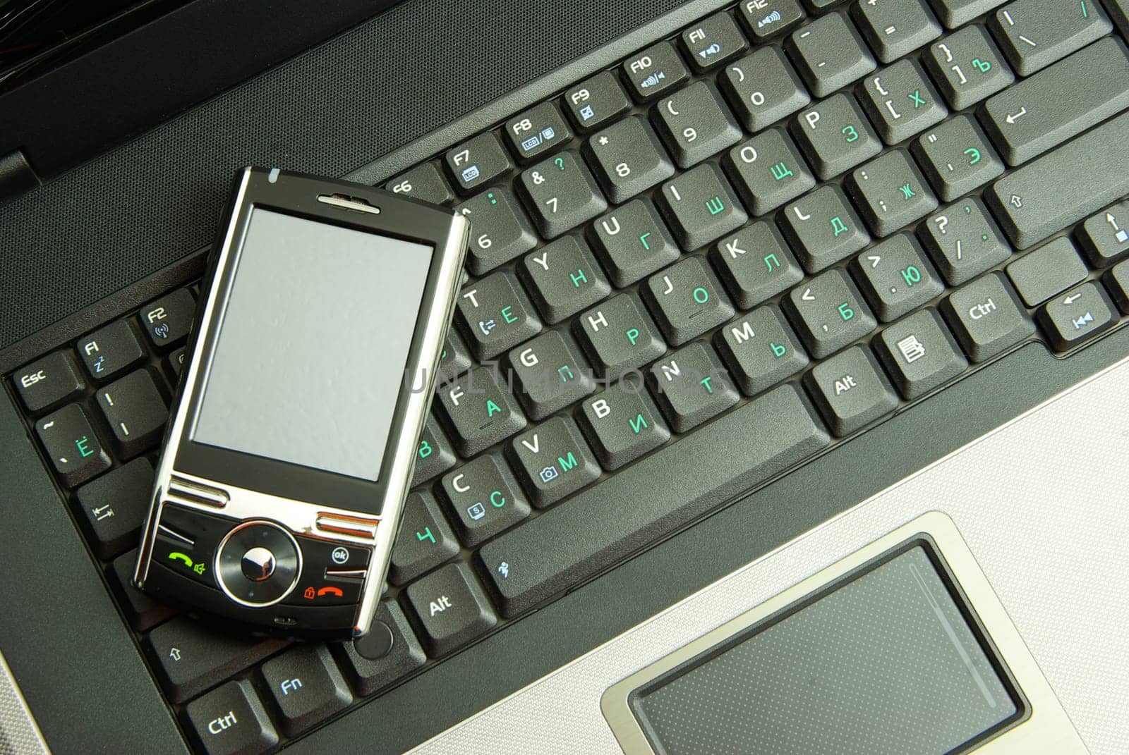 mobile isolated on a laptop