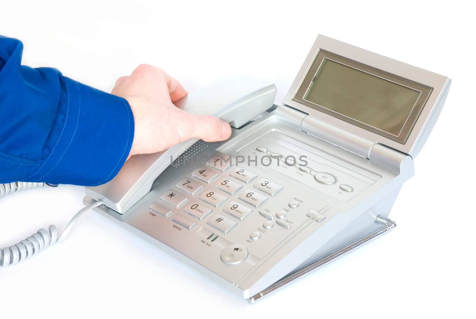 telephone receiver in hand isolated on white