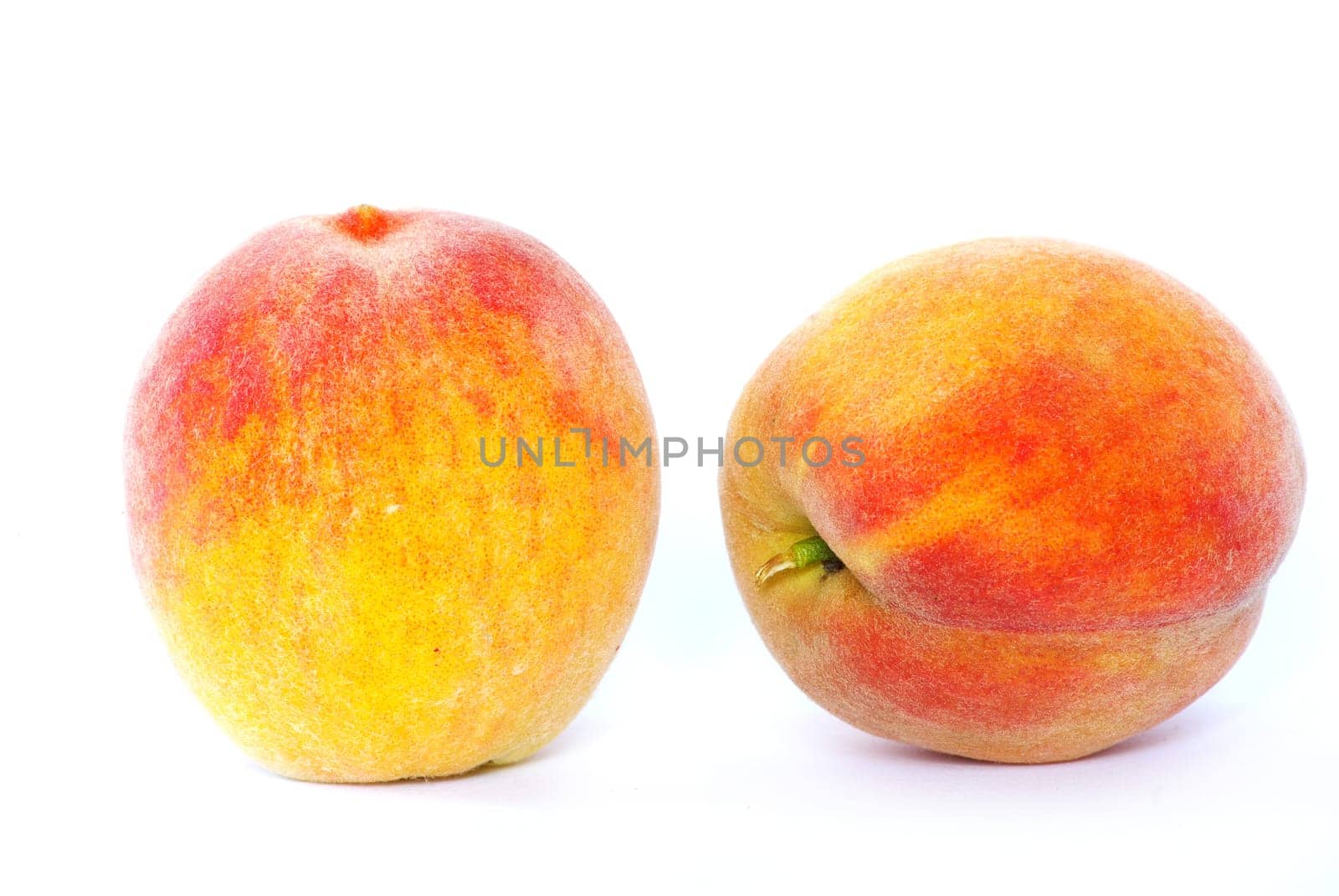 two peach isolated on white