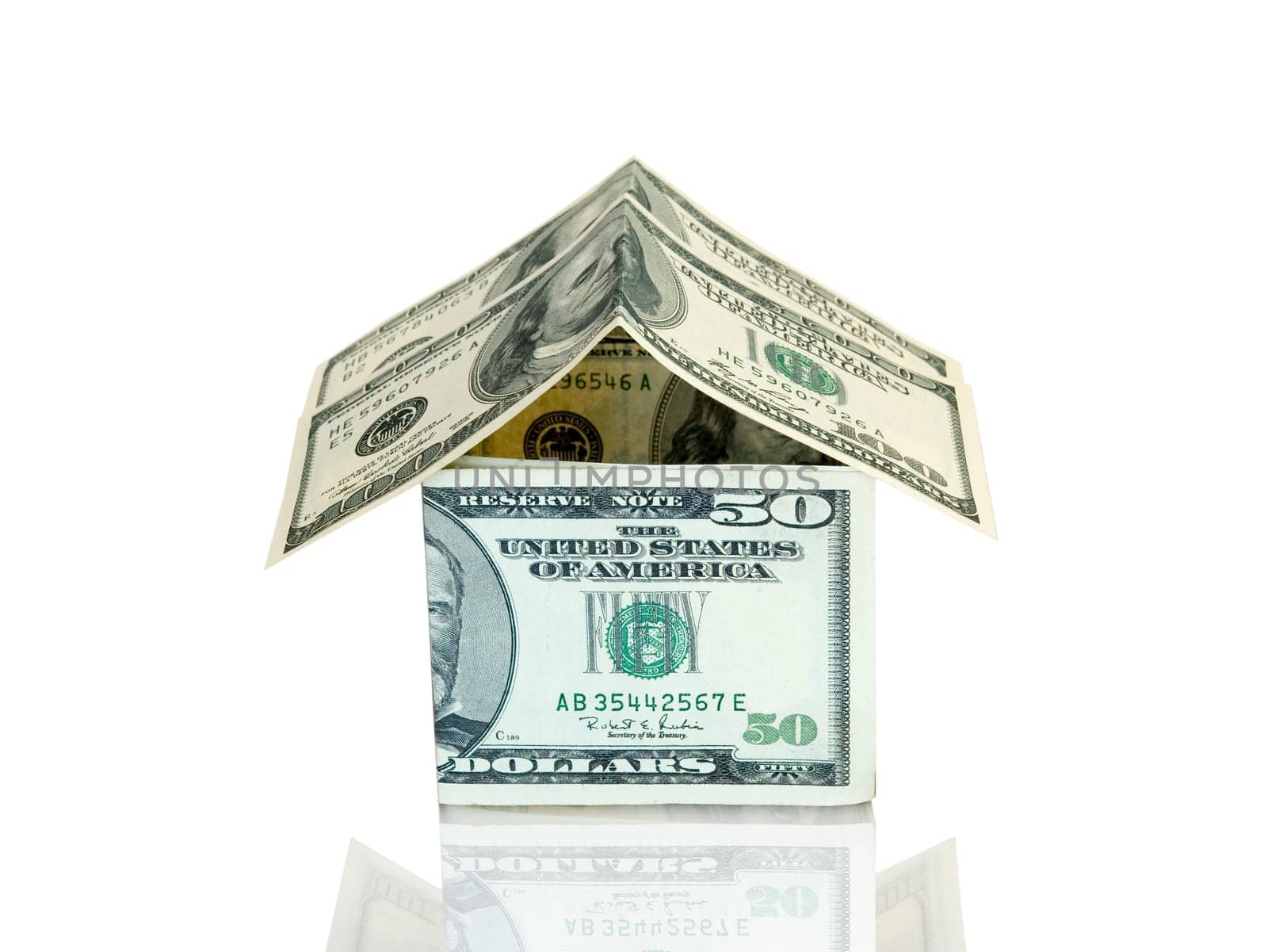 Money house on white background