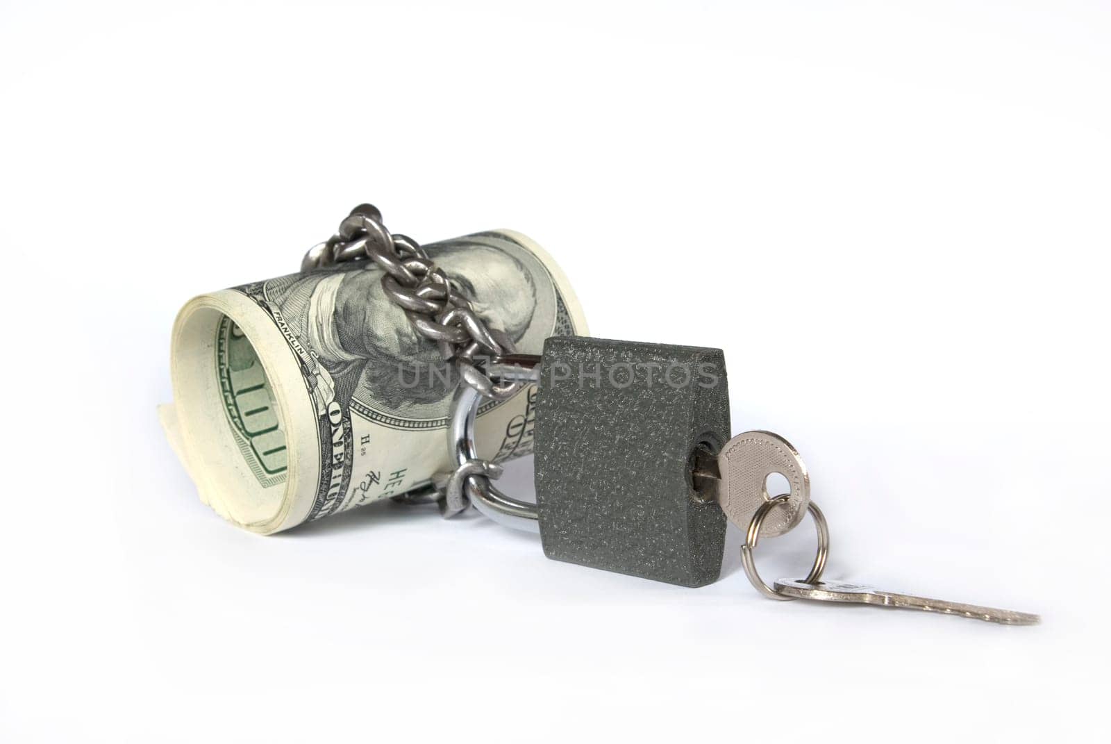 Dollars locked a chain on a white background