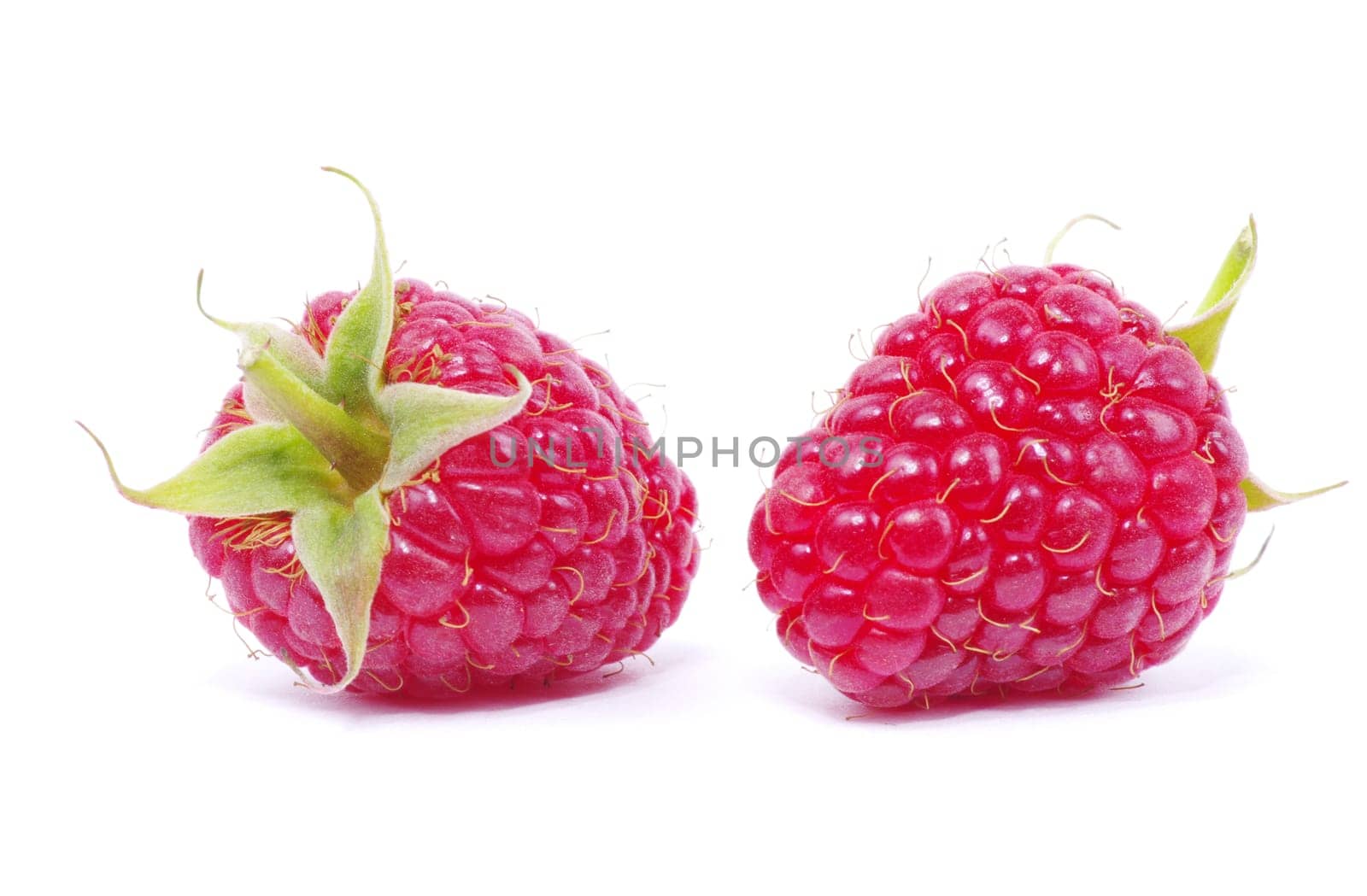Ripe raspberry isolated on a white background