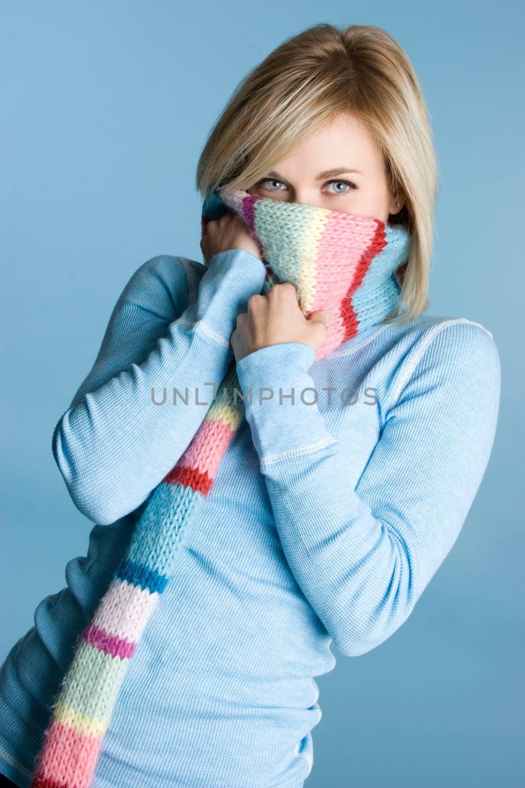 Pretty blond winter scarf woman