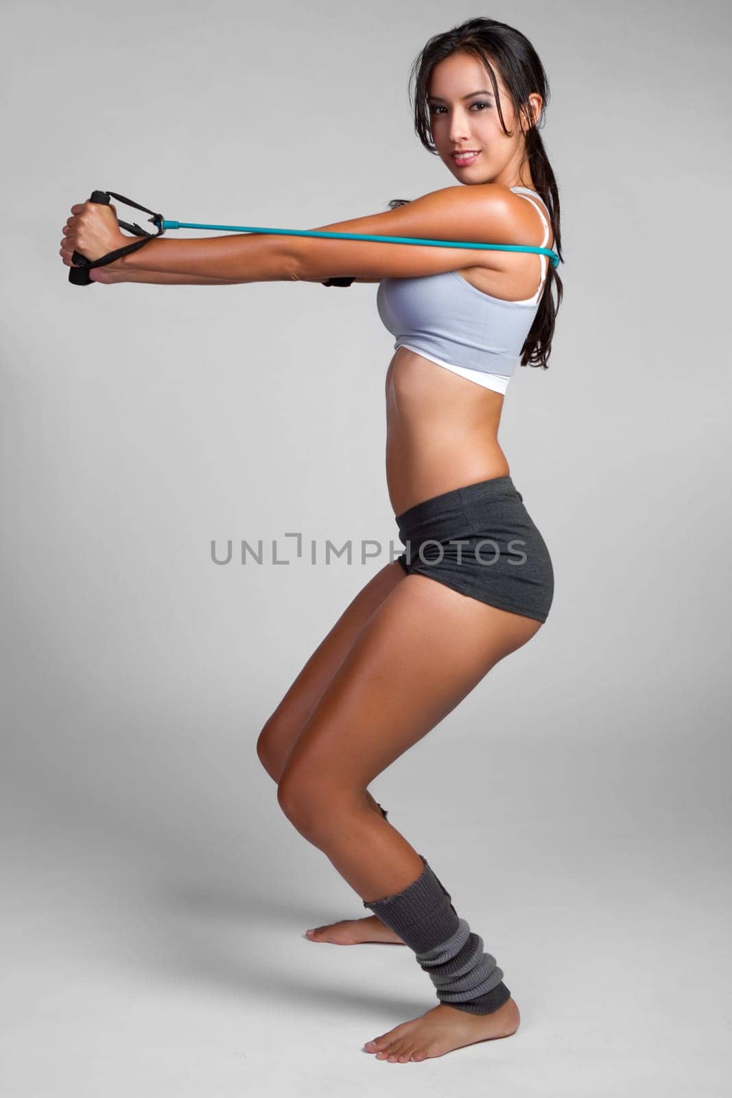 Young latina fitness woman exercising