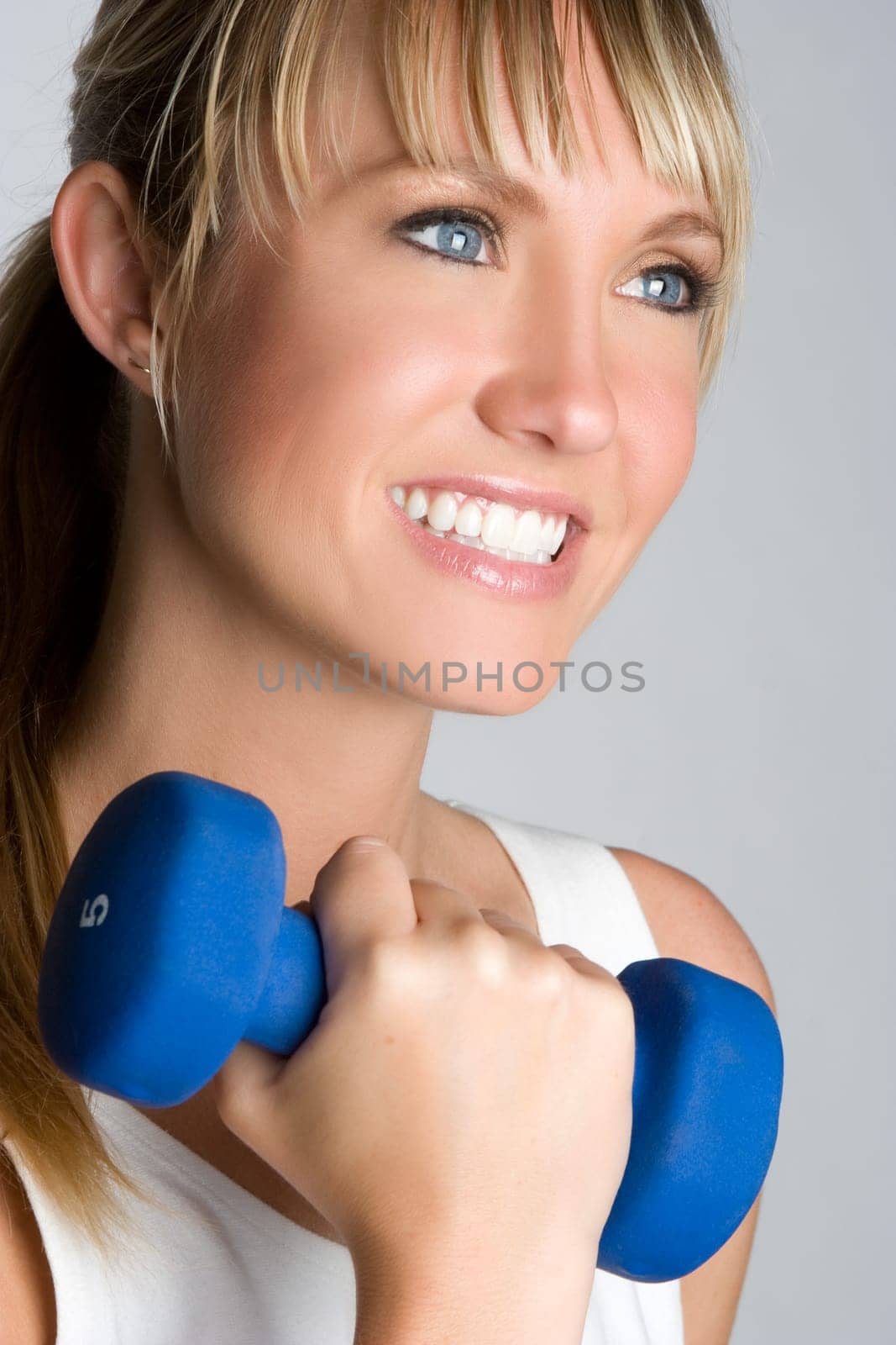 Beautiful smiling fitness woman closeup