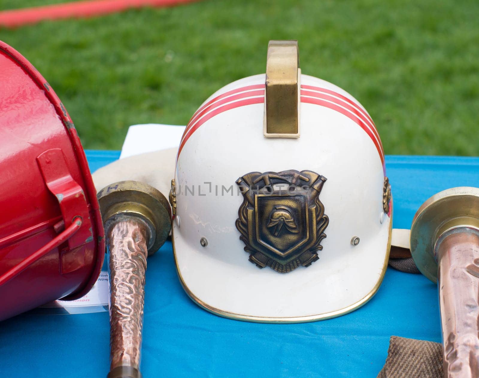 antique firefighter helmet on a table