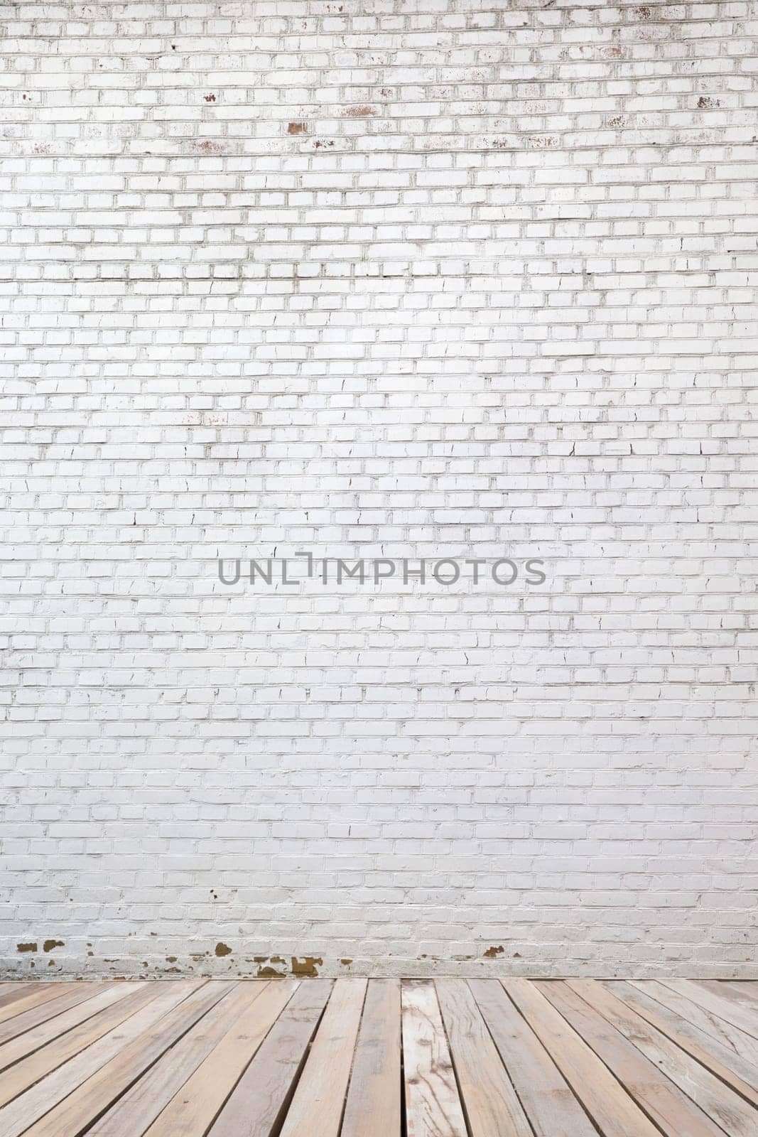 white brick wall and wood floor background