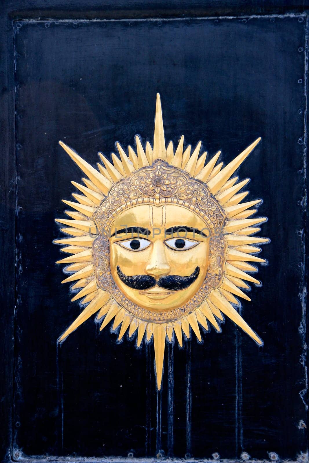 Etching of mask of Mewad kingdom at Pratap Smarak on Moti Magri hill in Udaipur, Rajasthan, India, Asia