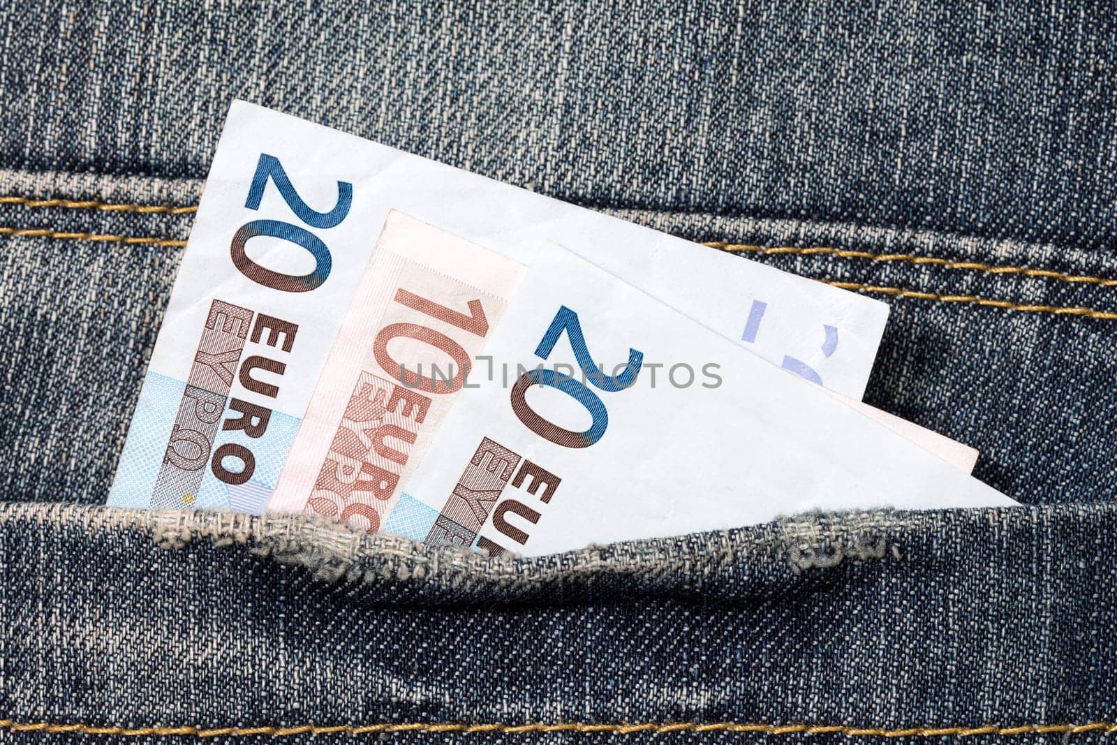 European currency banknotes in the jeans pocket