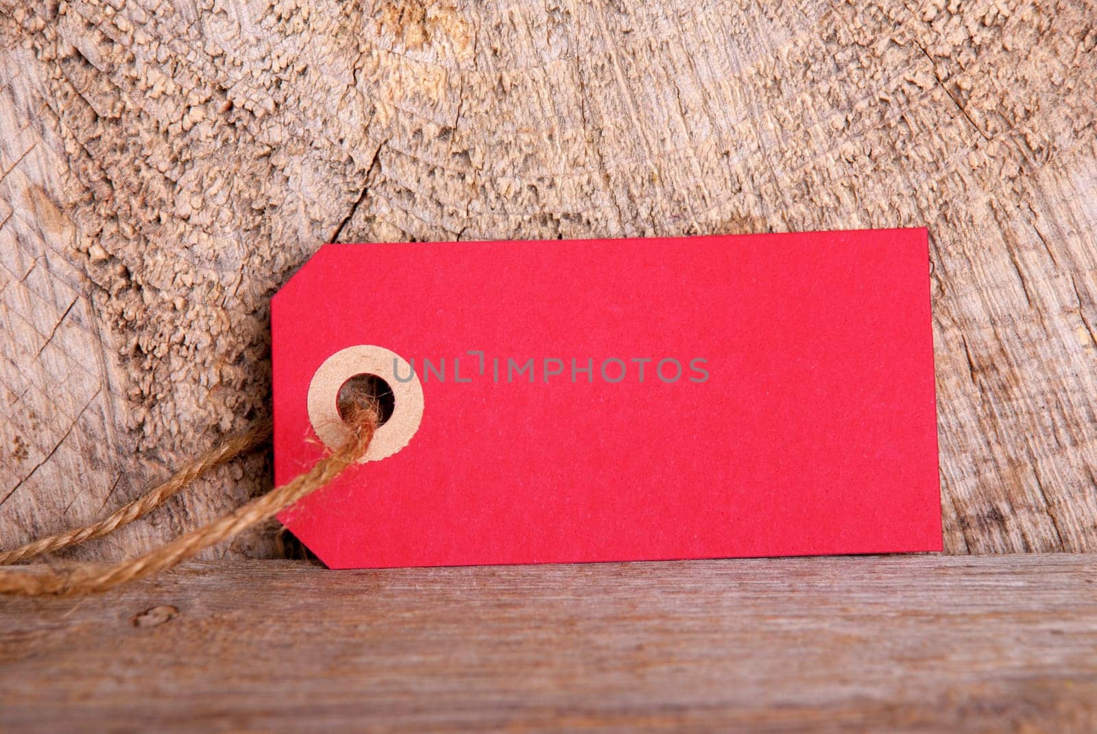Red Tag with Copy Space for Your Text, on Wood
