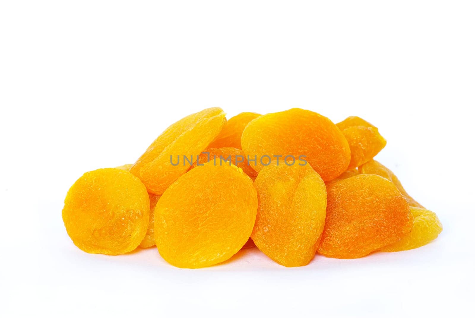 Dried apricot fruits isolated over white background