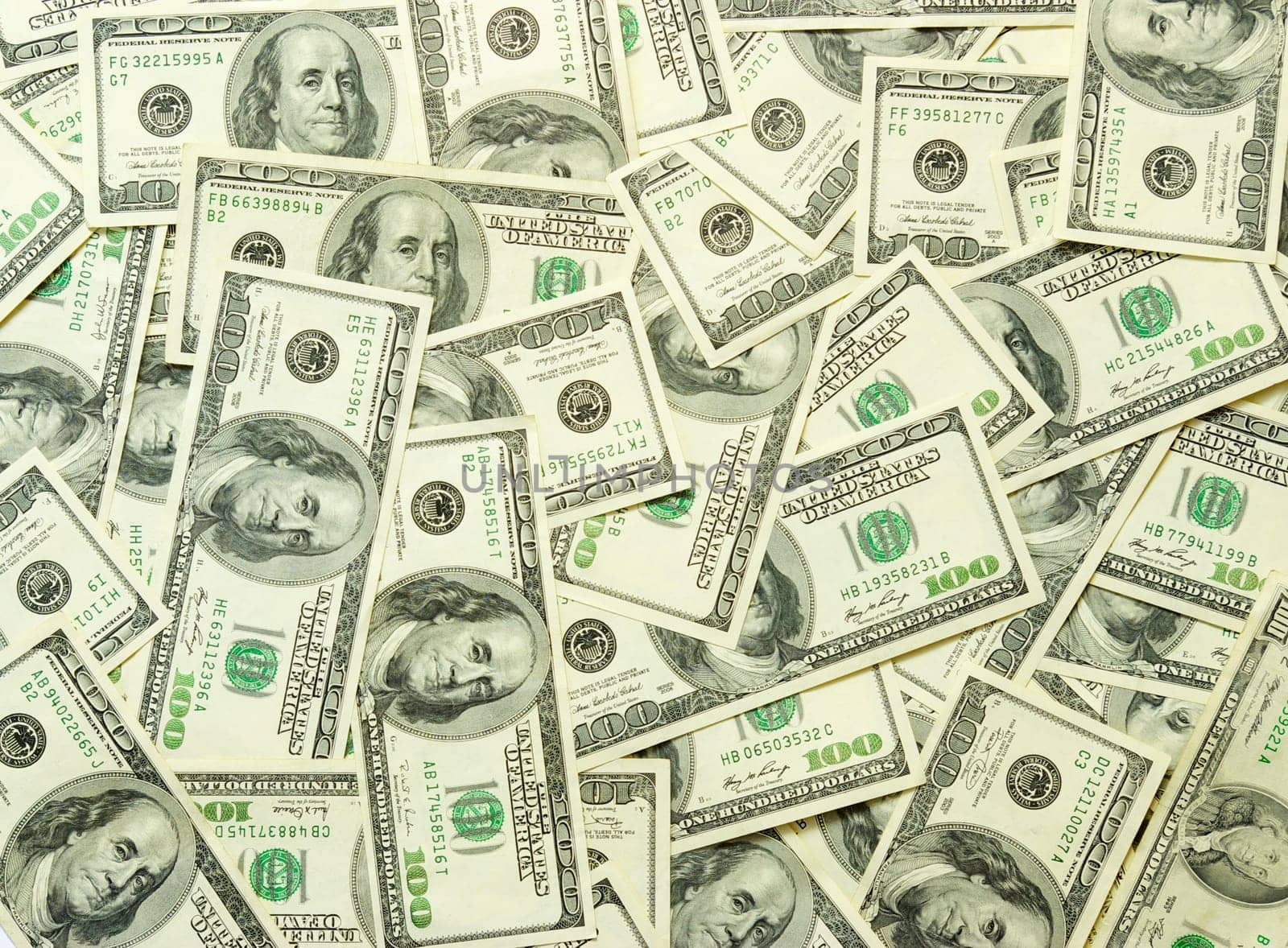 american dollars arranged at the background