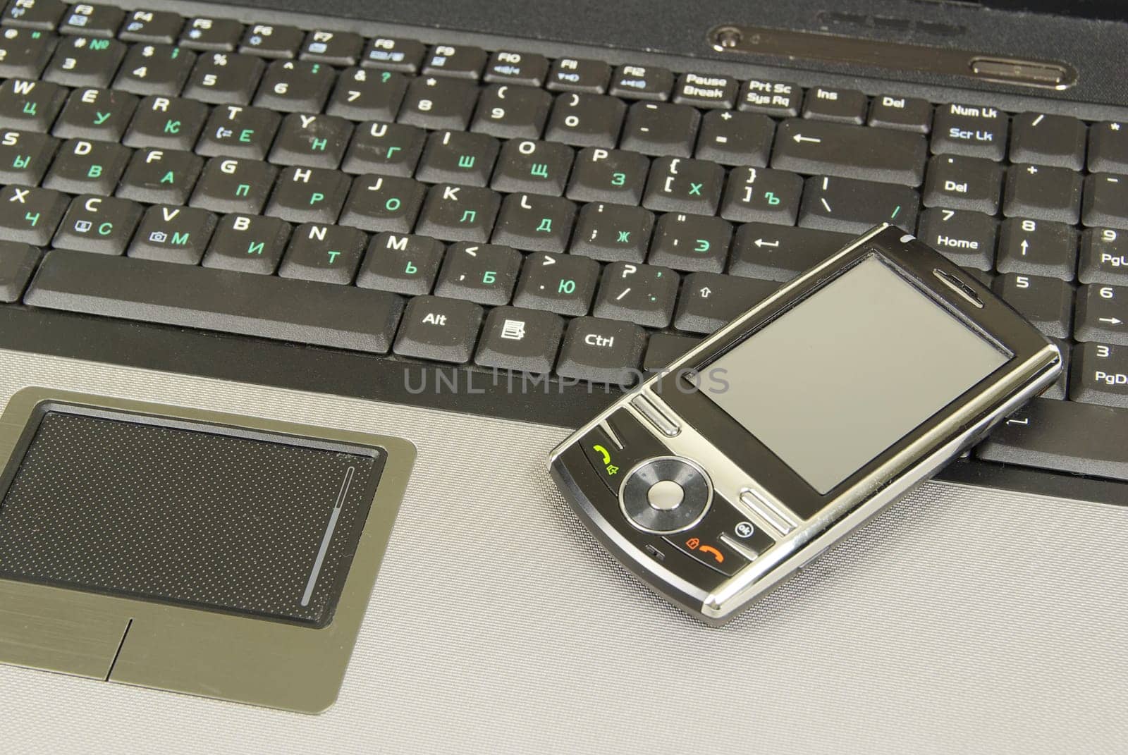 mobile isolated on a laptop