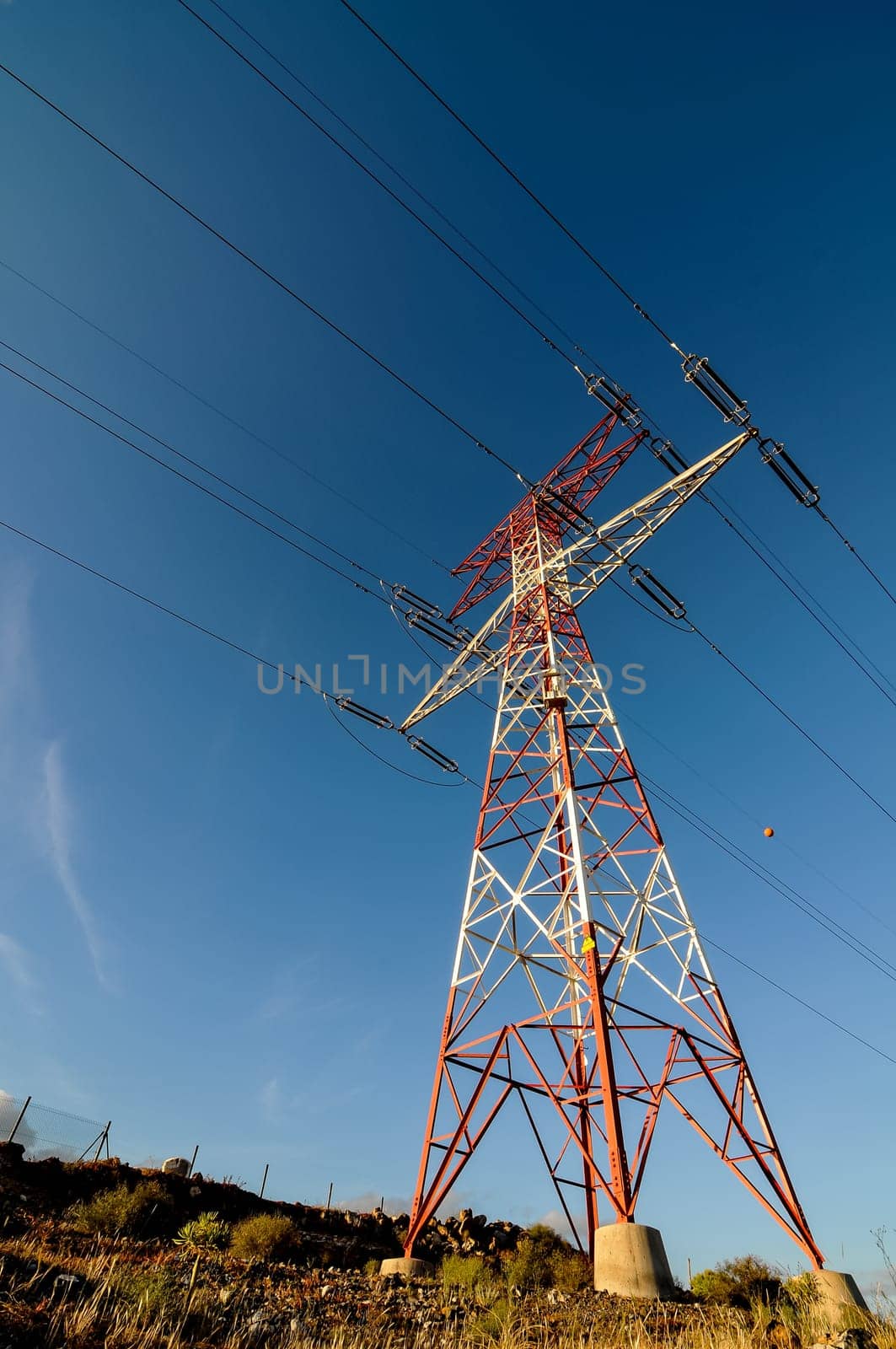 Energy Electricity Power Pylon on a Blue Sky