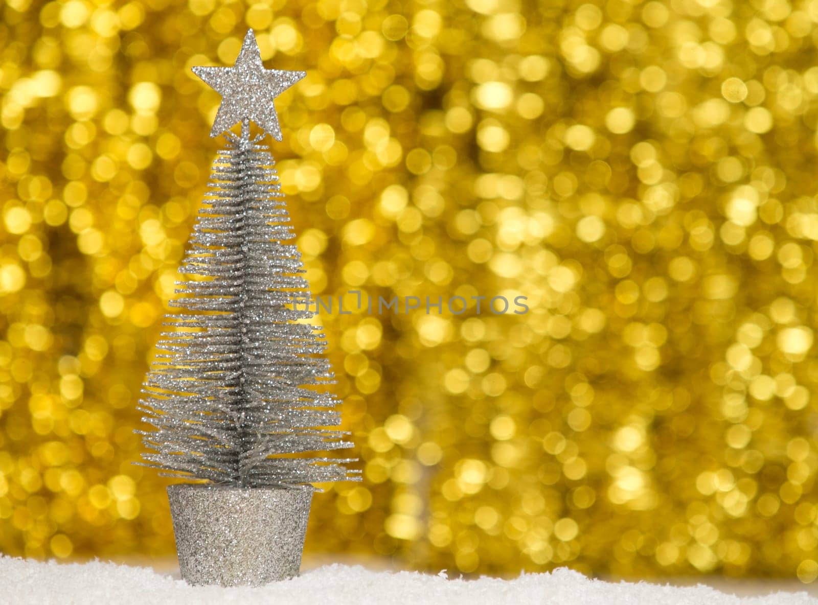Decorative Christmas tree isolated on bokeh background