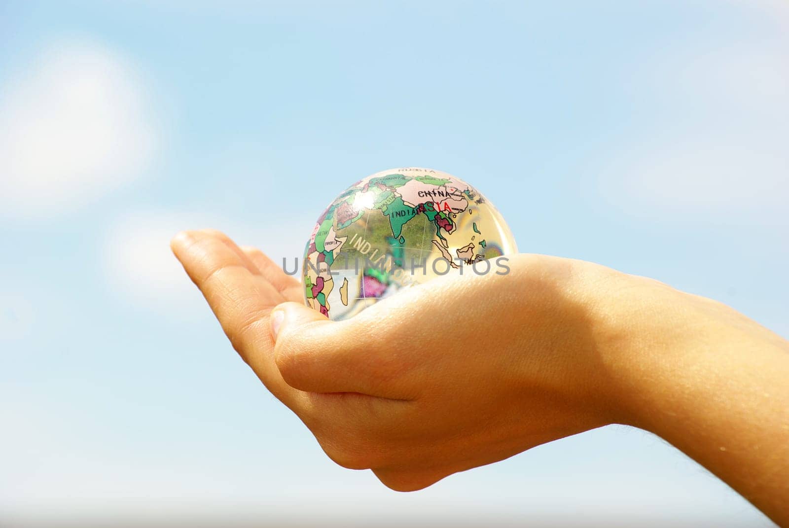 globe on the human hand