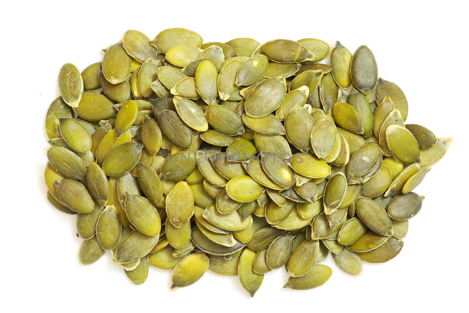 fresh pumpkin seeds isolated on a white