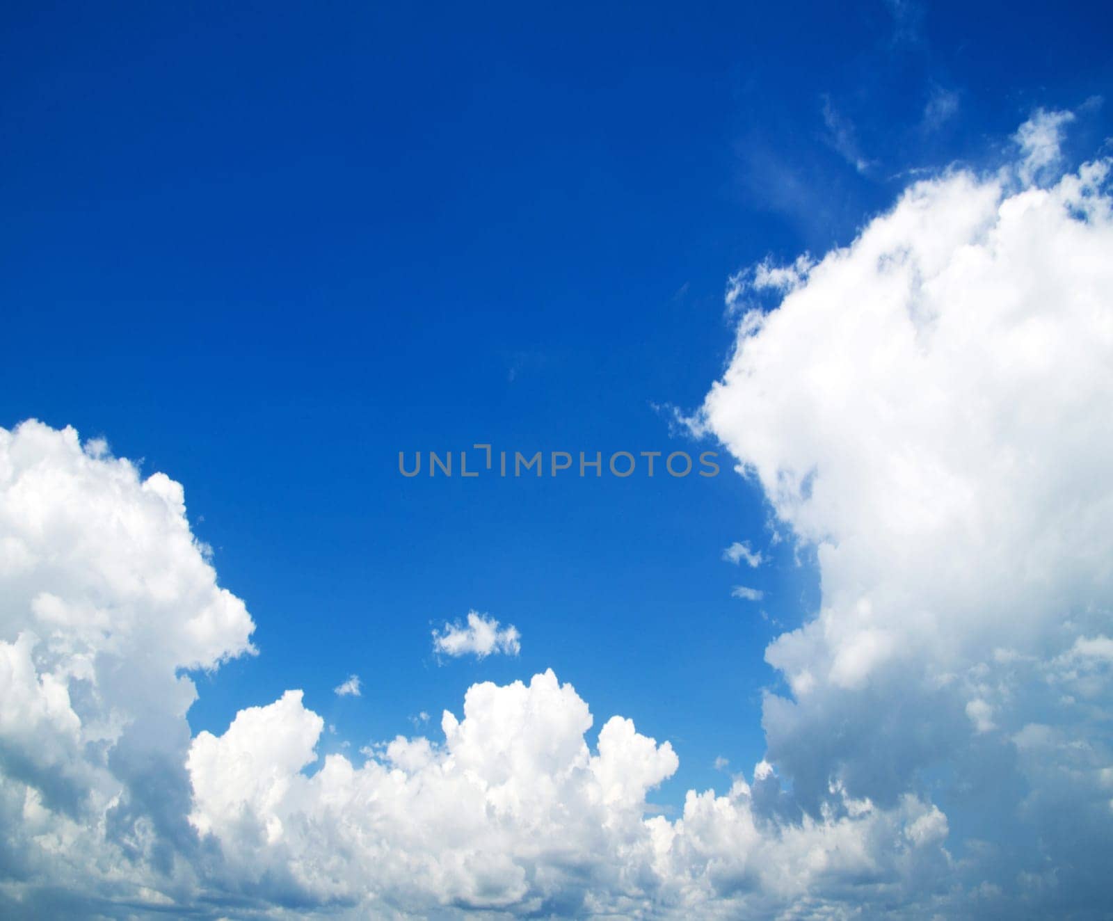 blue sky with clouds and sun