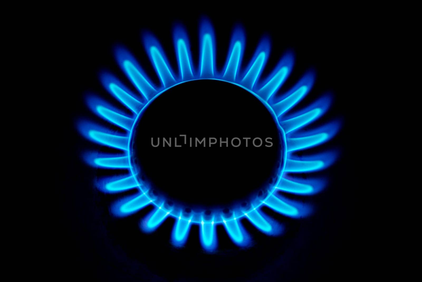 flames of gas stove in the dark