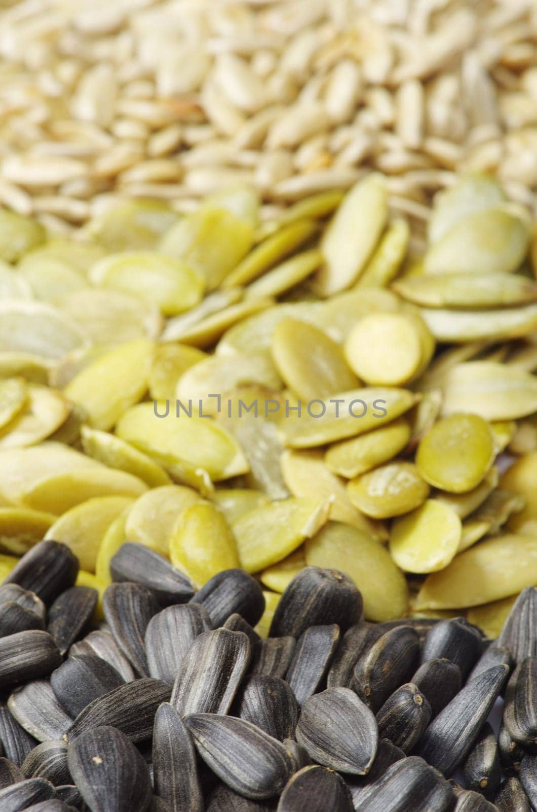 Close up image of sunflower and pumpkin seeds
