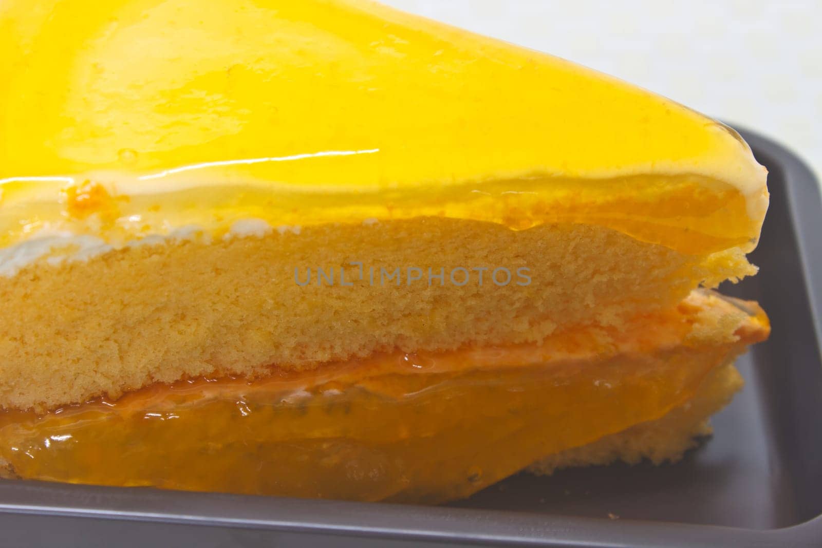 Dessert Orange Cheesecake in plate on background