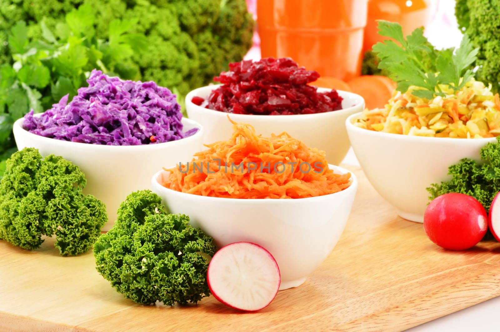 Composition with four vegetable salad bowls