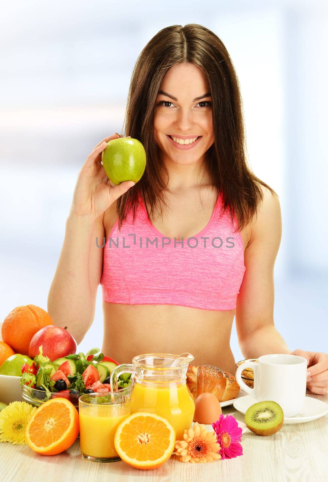 Young woman having breakfast. Balanced diet.