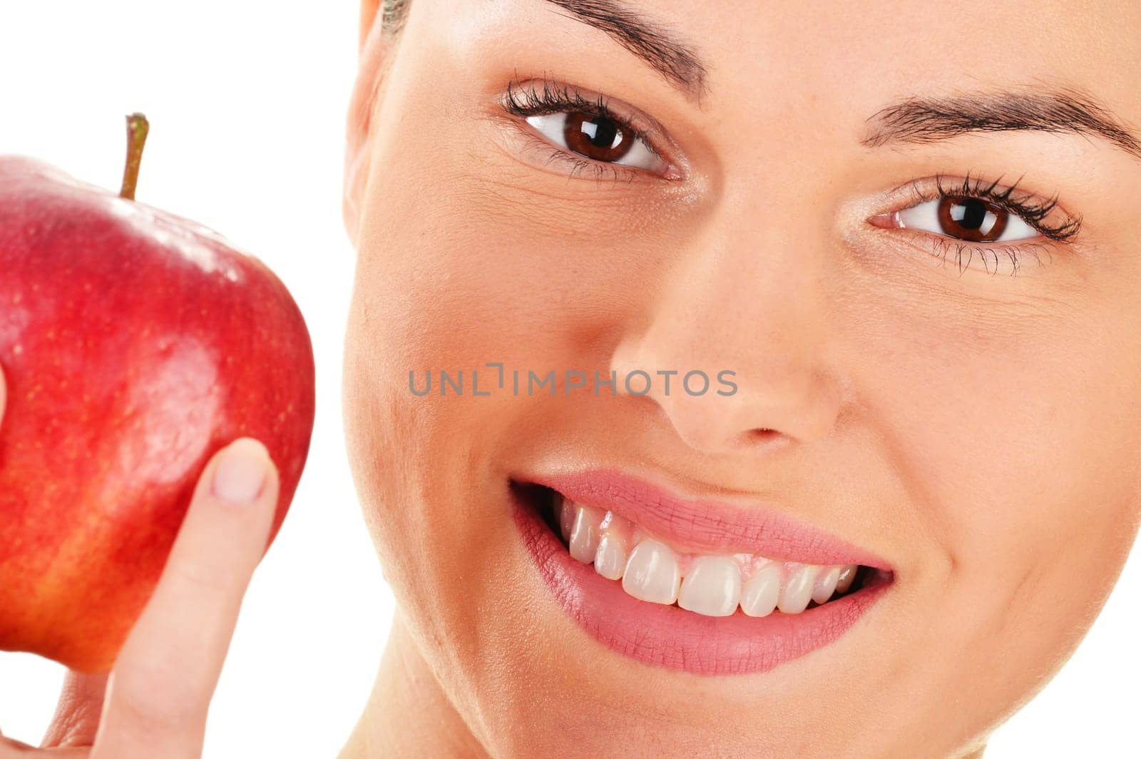 Portrait of young woman holding apple isolated on white