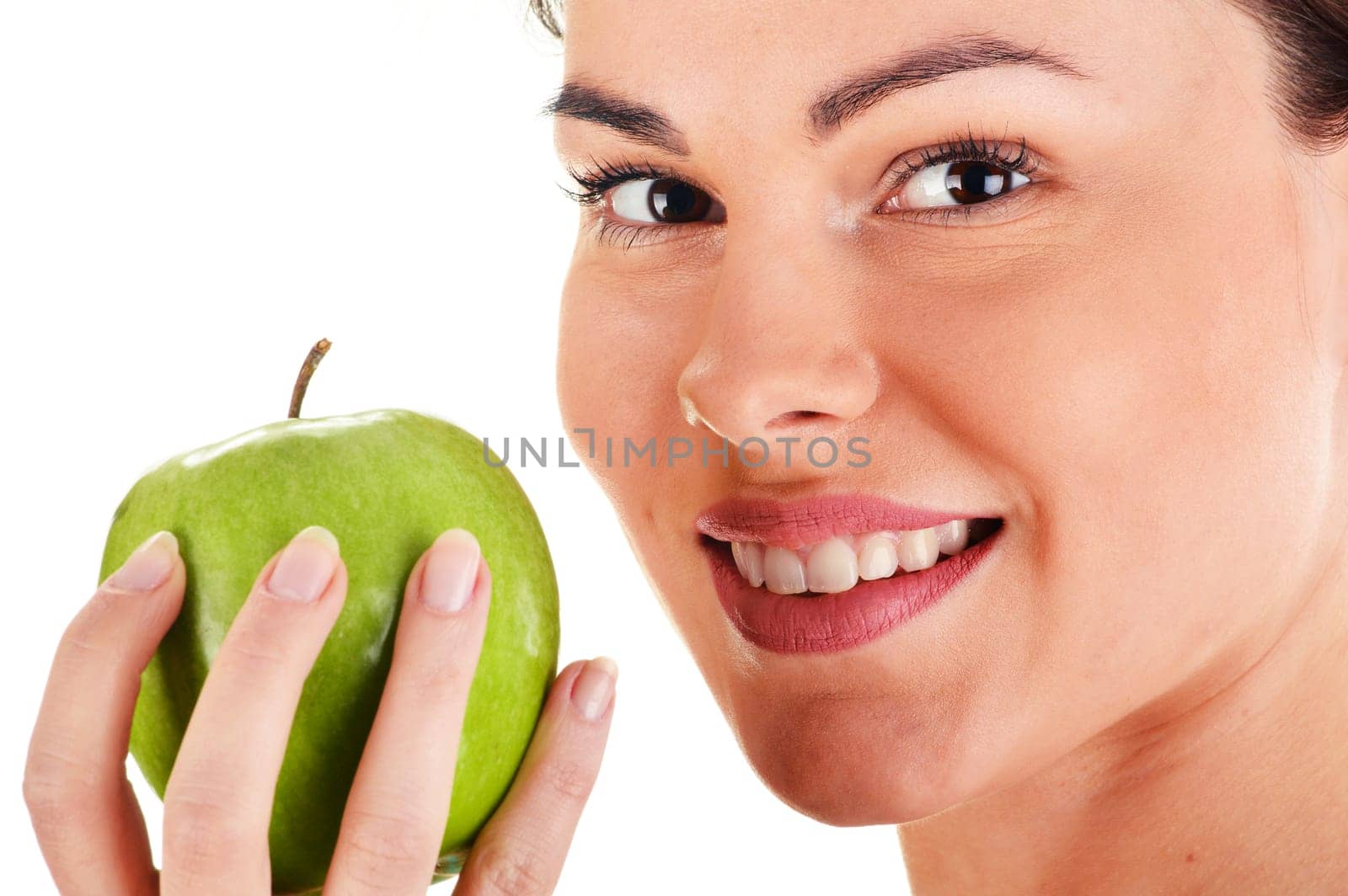 Portrait of young woman holding apple isolated on white