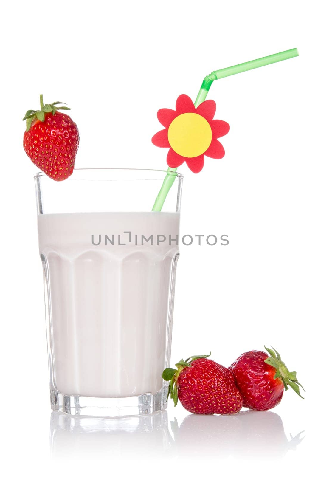 Strawberry cocktail in a glass and strawberries on white background