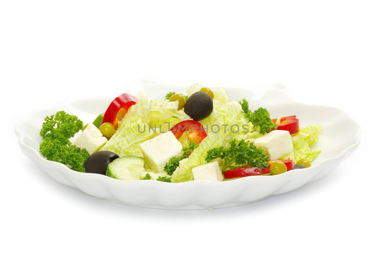 salad in plate on white