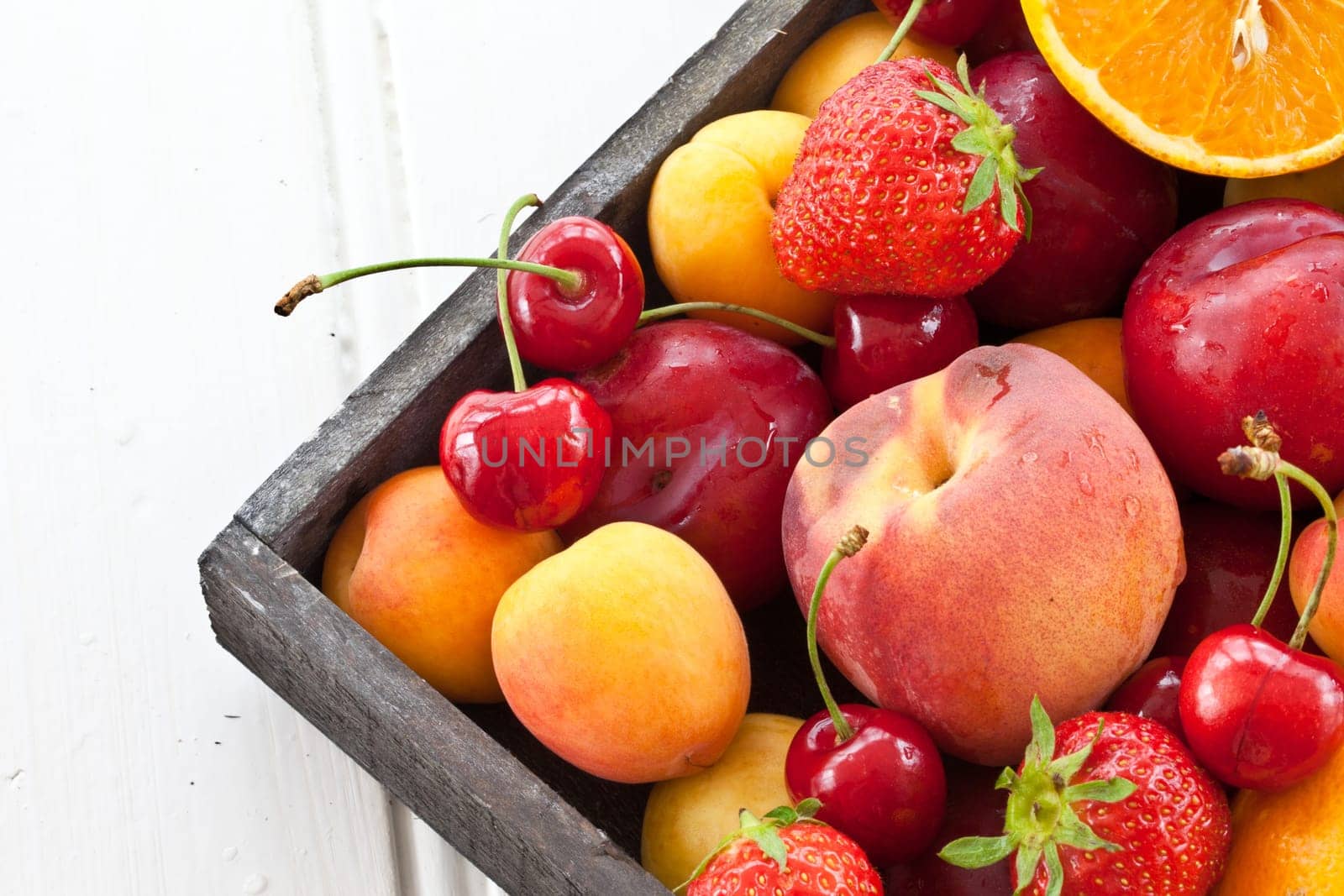 Fresh colorful Somer Fruechte as background