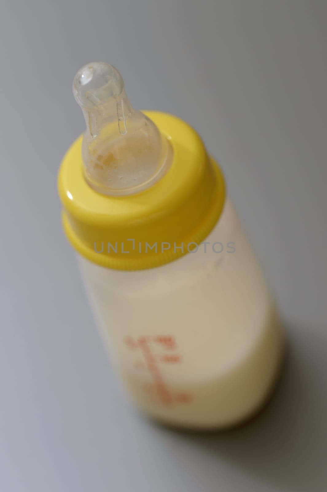 A close up shot of a baby bottle