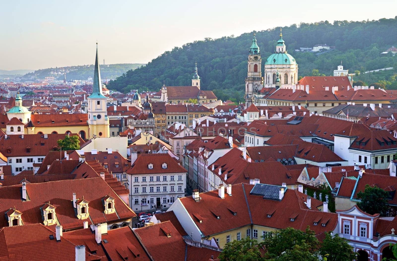View of the red tiled roofs of the old town of Prague. Concept - tourism, travel.