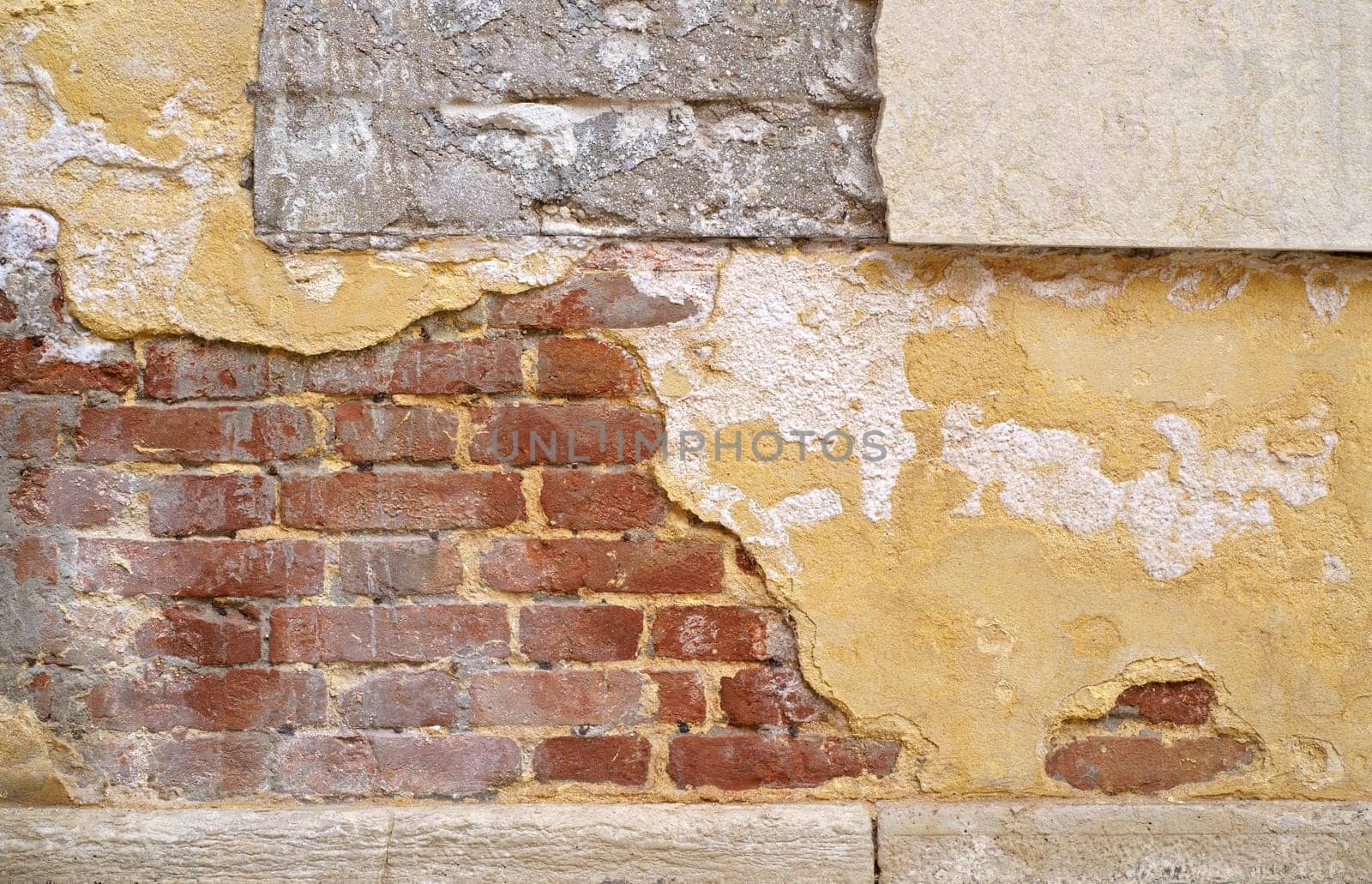 Texture of an old brick wall. Brick walls of Venice. Clay brick walls of Italy. italian architecture and heritage by aprilphoto