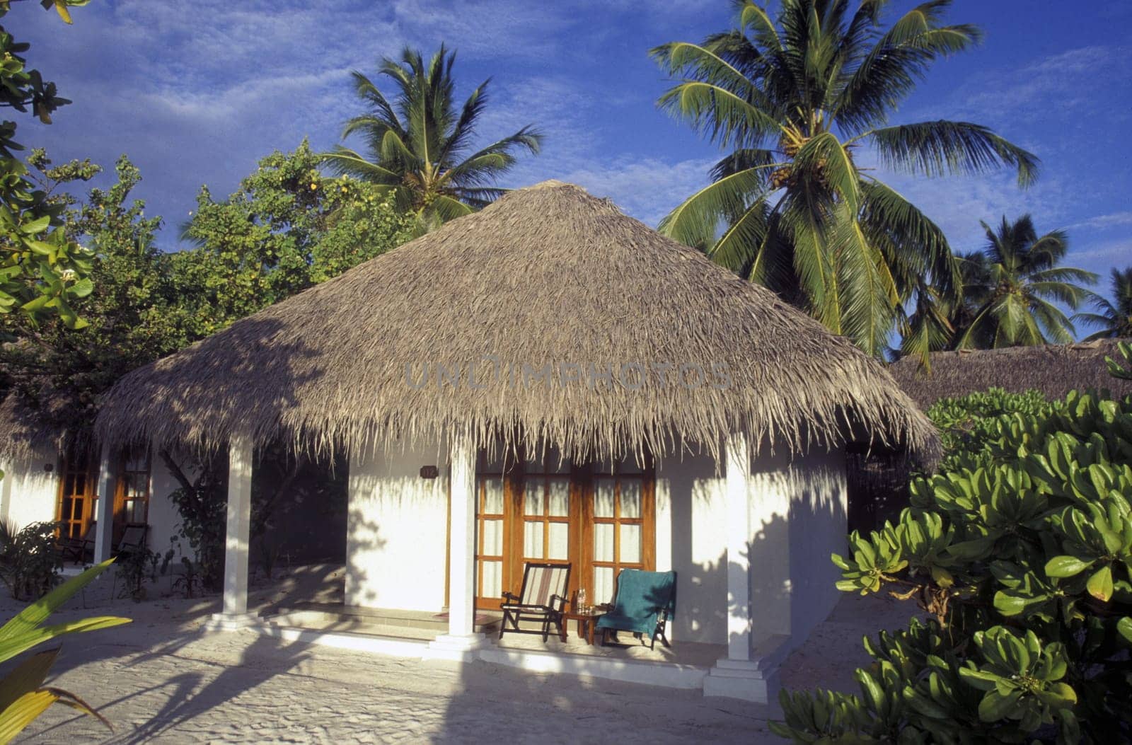 Bungalows of a hotel complex on the islands of the Maldives in the Indian Ocean.