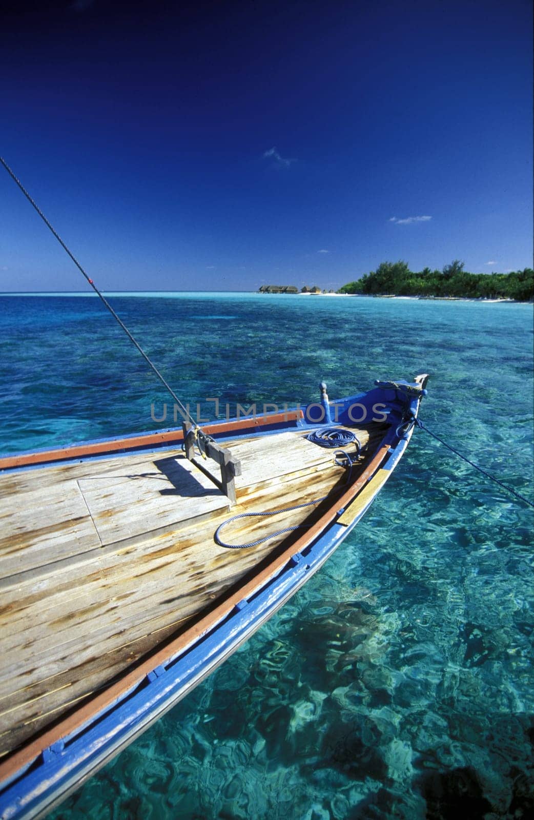 .On a Dhoni sailing ship in the island world in the Northmale Atoll on the islands of the Maldives in the Indian Ocean.