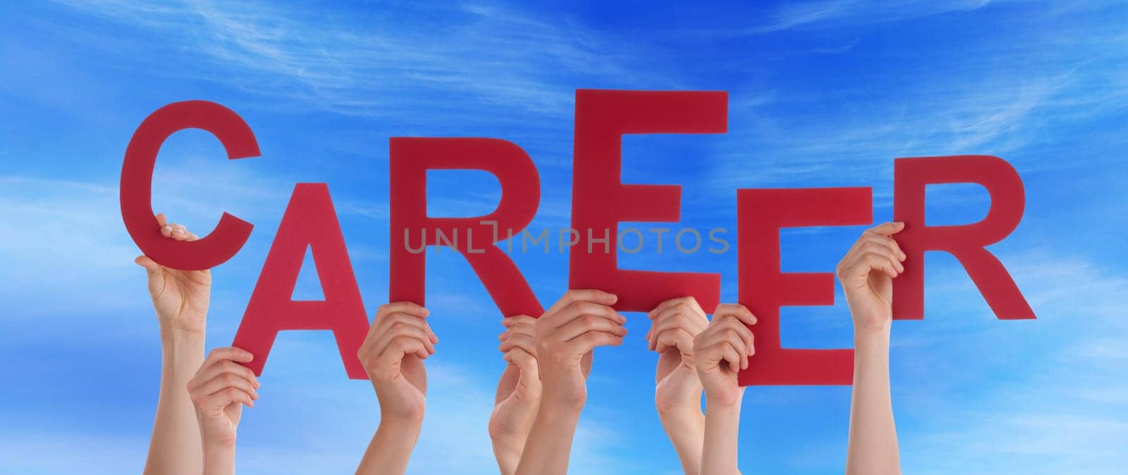 hands holding four pieces of a puzzle with copy space, gray background