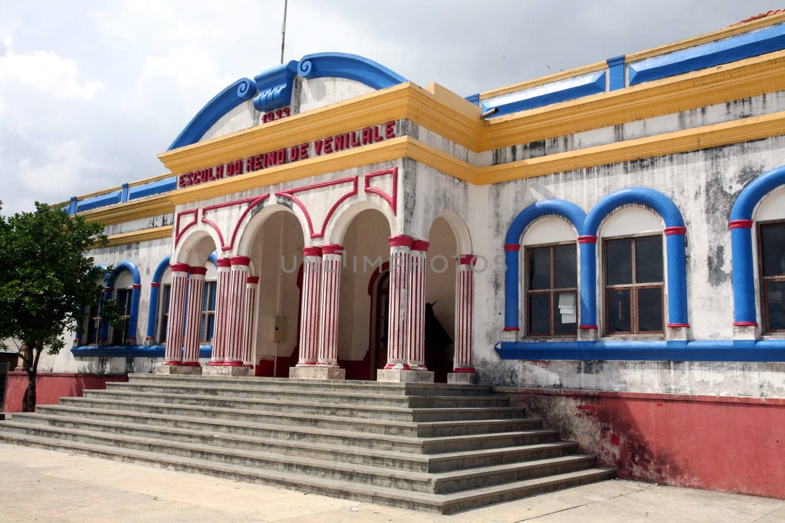 Schoolchildren in front of the colonial schoolhouse in Venilale in Zental East Timor on the two separate island of Timor in Asia.