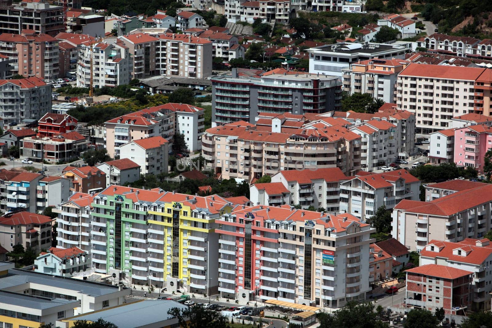 The modern center of the Adriatic city of Budva with many new apartments in Montenegro in the Balkans on the Mediterranean Sea in Europe.