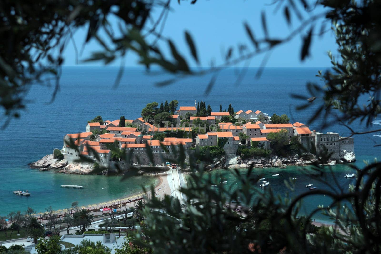 The hotel island Sveti Stefan on the Mediterranean Sea in Montenegro in the Balkans in Europe.