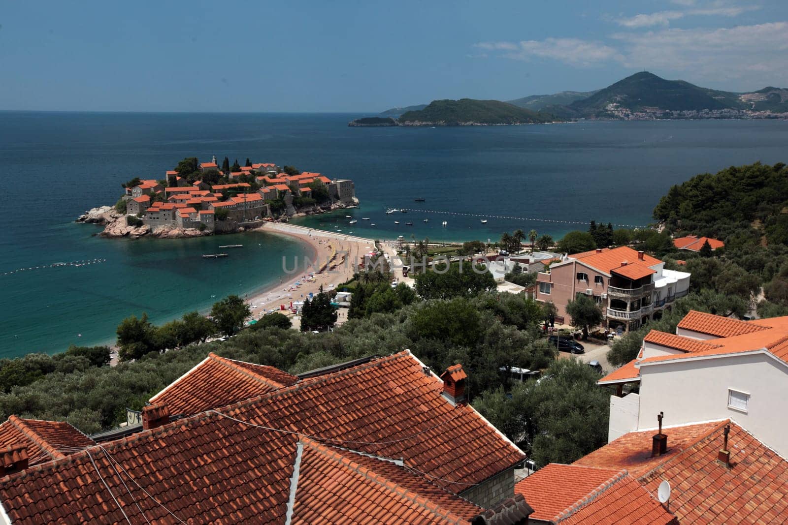 The hotel island Sveti Stefan on the Mediterranean Sea in Montenegro in the Balkans in Europe.