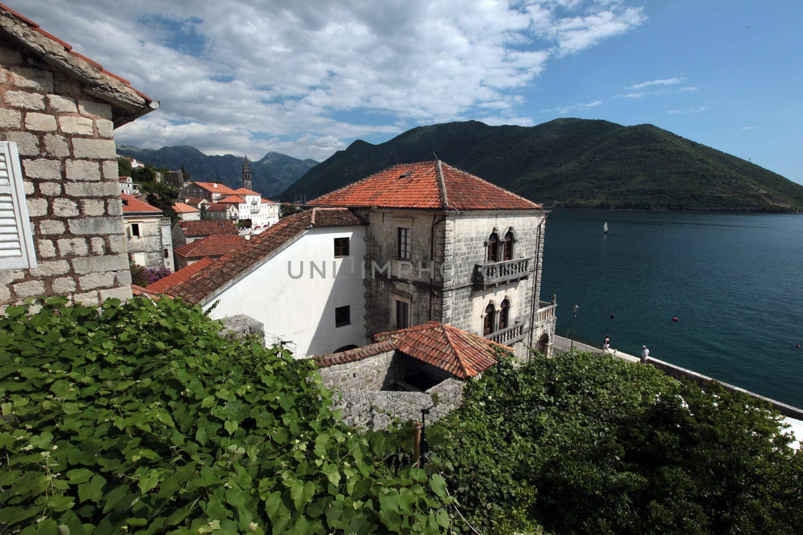 The village of Persat in the bay of Kotor on the Mediterranean Sea in Montenegro in the Balkans in Europe.