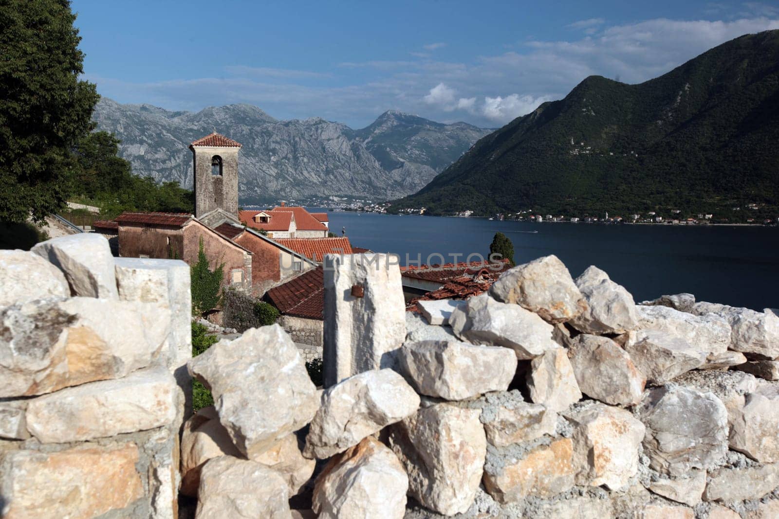 The village of Persat in the bay of Kotor on the Mediterranean Sea in Montenegro in the Balkans in Europe.