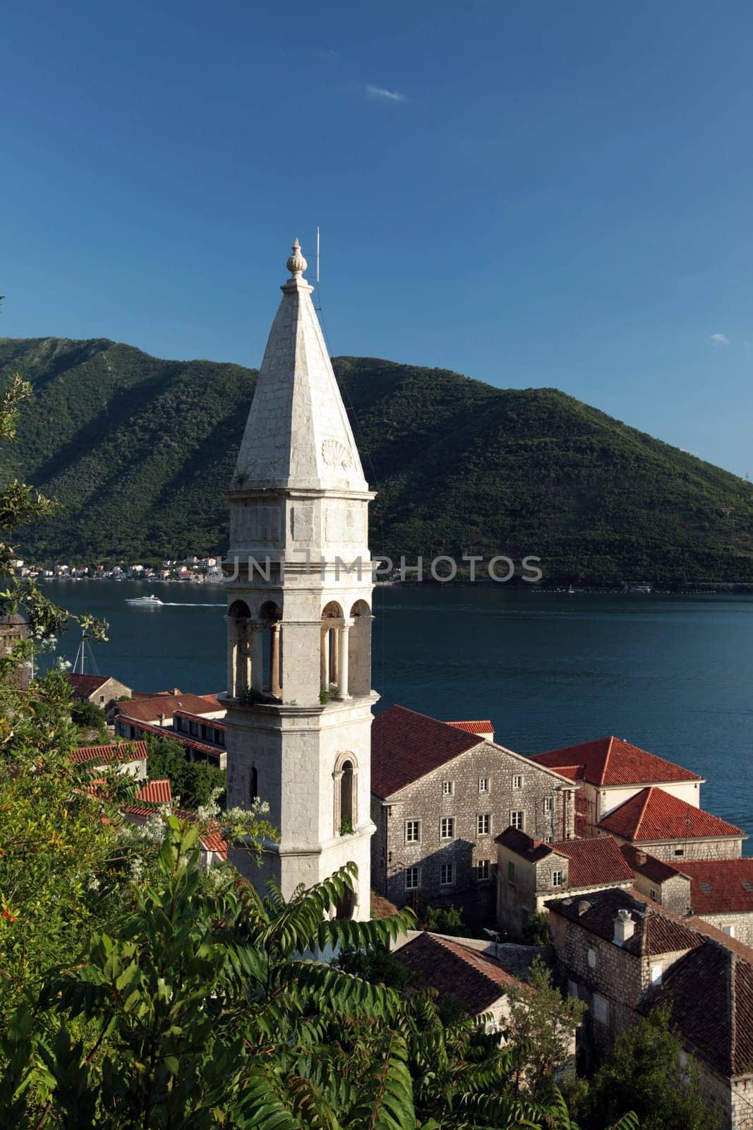 The old town of Persat in the inner bay of Kotor in Montenegro in the Balkans on the Mediterranean Sea in Europe.