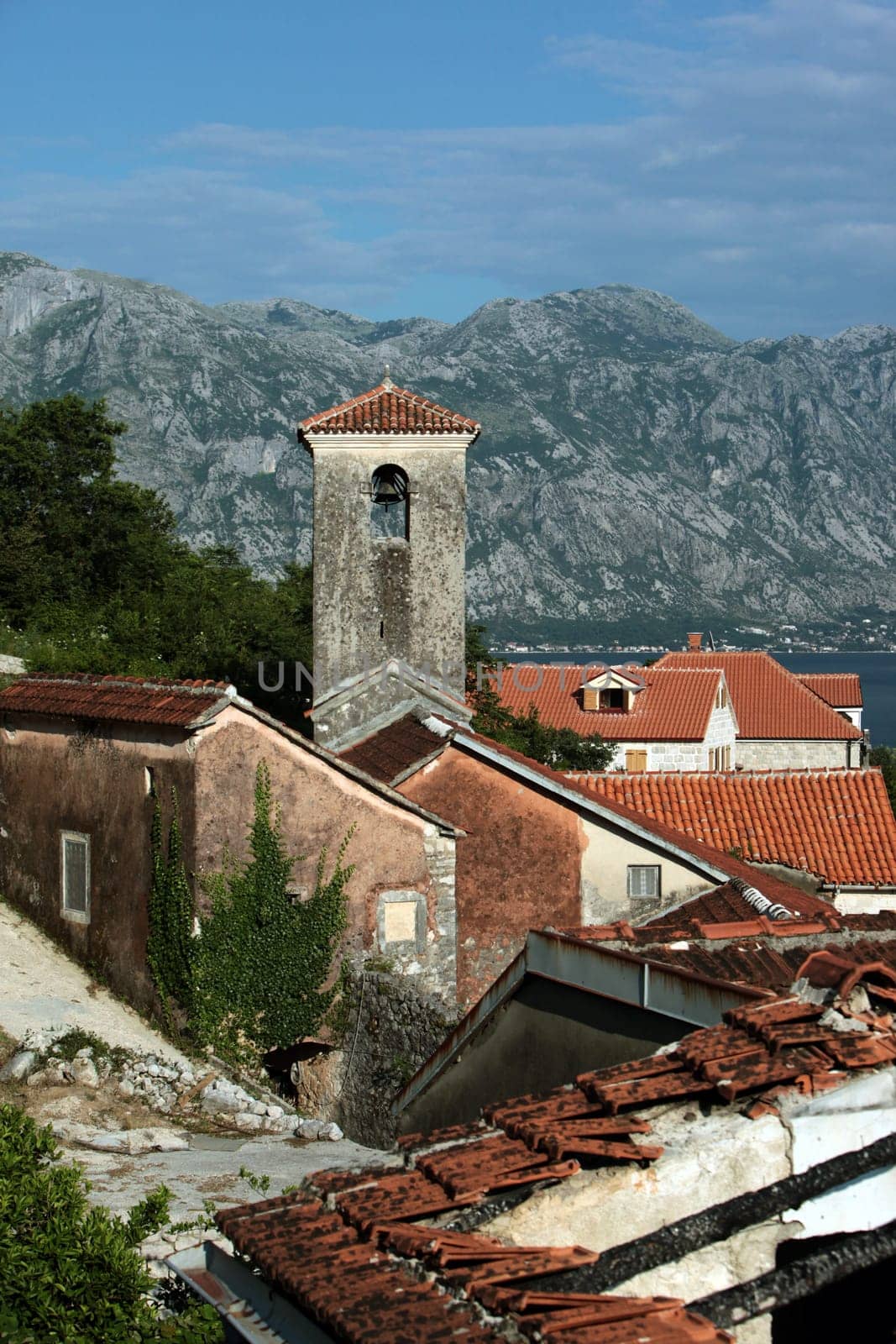 The old town of Persat in the inner bay of Kotor in Montenegro in the Balkans on the Mediterranean Sea in Europe.